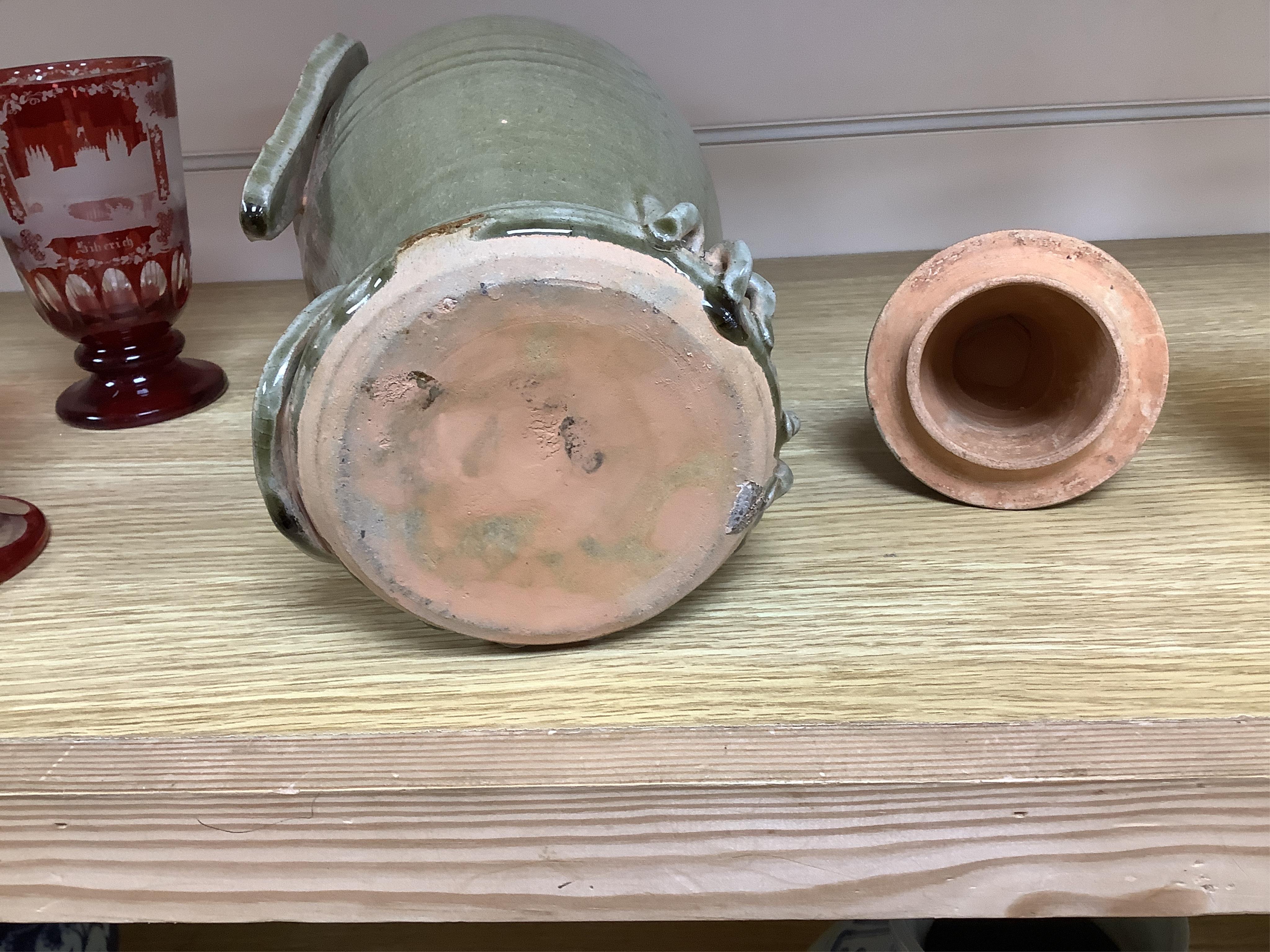A Korean green glazed bird jar, 33cm high